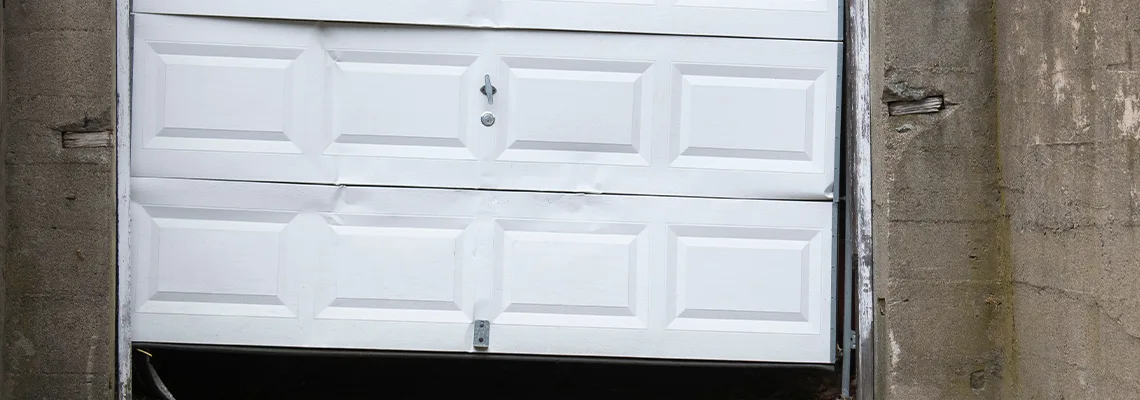 Garage Door Got Hit By A Car Dent Removal in Bracebridge, ON