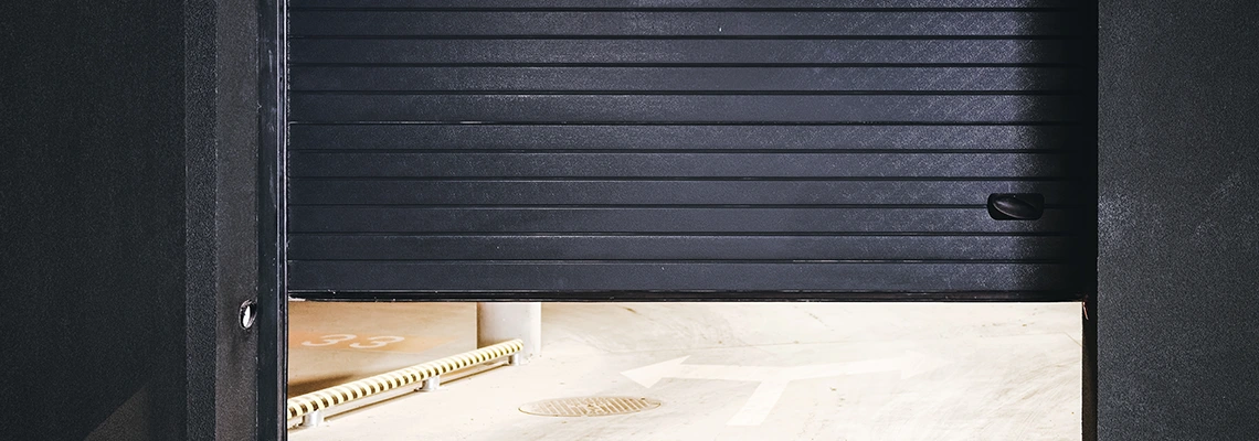 Residential Black Garage Door Installation in Bracebridge, ON